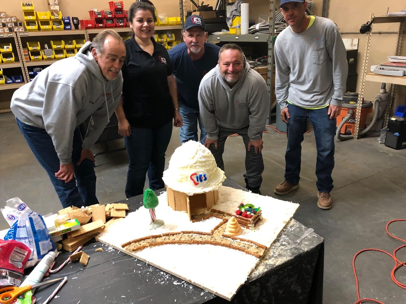 IES Residential team after a team-building build in the shop